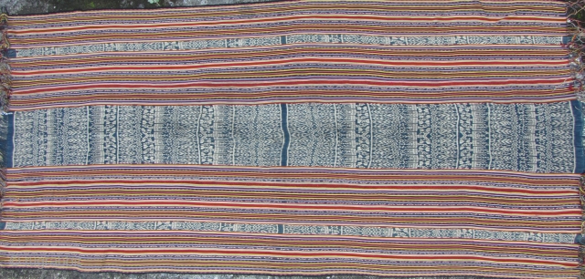 Beautiful West Timor (most likely Isana), Indonesia, three paneled, ikat blanket. This is woven from a combination of natural dyed home spun cotton and commercial thread. The blue ikat bands are made  ...