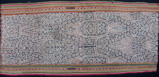 Iban woman’s kain skirt from Sarawak depicting the tree of life with bamboo running the length of the bidang. There is some fraying on the selvedge, and a seamless repair noted in  ...