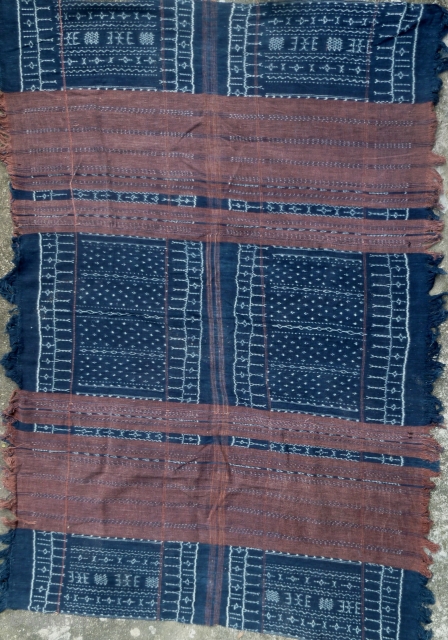 All natural dyed and handspun “resist” dyed woman’s sarong from the Flores, Nage Keo District, Lesser Sunda Islands, Indonesia. Loosely woven- in excellent condition. L: 201cm/79in and W: 140cm/55in (without fringe).

http://www.trocadero.com/stores/abhayaasianart/items/1390937/item1390937store.html  