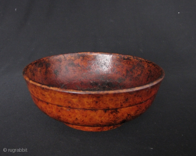 Sino Tibetan Lacquer Bowl: Nice old wood bowl from circa late 19th to early 20th century- some losses to the lacquer but otherwise good condition. D: 16.3cm/6.4in an H: 6.4cm/2.5in

http://www.trocadero.com/stores/abhayaasianart/items/1370339/item1370339store.html
   