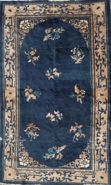 Old Chinese rug woven in Beijing/Tianjin, circa late 19th to early 20th century, with abstract archaic foliate border and ten floral sprays on the field repaired with frayed edges- still quite pretty  ...