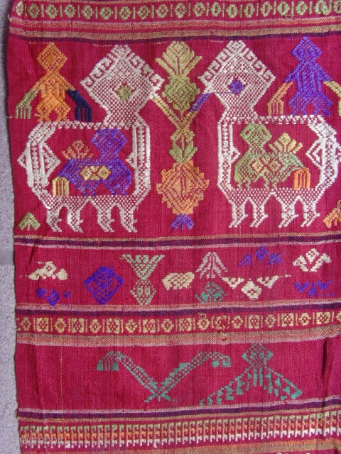 Tai Lue weaving, cotton supplementary weft with silk embroideries.


Tai Lue.


Minority group Laos and Thailand.


Seconed Quarter 20th Century.


0.87 X 0.24 CM
             