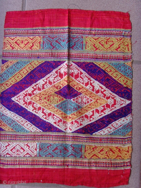 Tai Lue weaving, silk supplementary weft with silk embroideries.
Minority group Laos and Thailand.
Early 20th century.
0.43 X 0.33  m
              