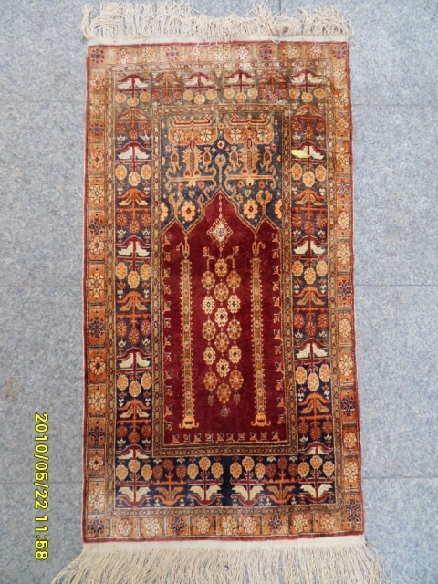 Anatolıan Kayseri Silk Prayer Carpet inside the silver metals. size: 108x58 cm.                     