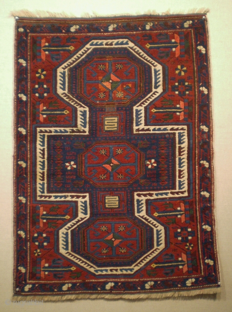 Unusually small Caucasian rug (99 x 73 cm.), Northern Azerbaijan, Quba area (Ordutch Konagkend). Early 20th century, good condition overall with some old repair.         