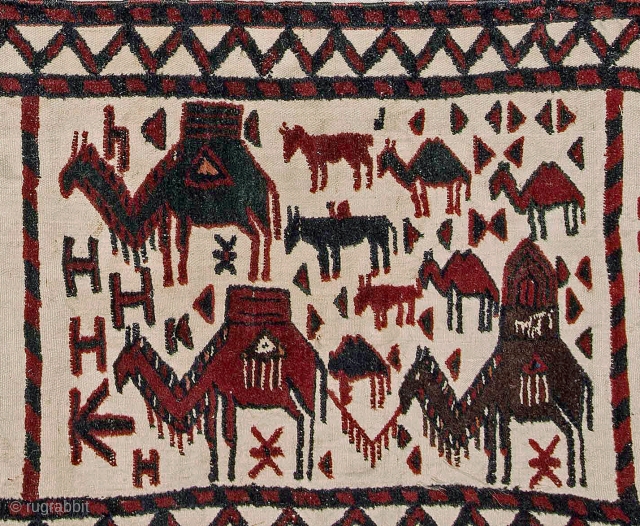 Complete Turkmen tent band with wedding caravan. Central Asia early 20th c. Finely woven in wool with silk highlights and measuring 40 x 1260 cm. this tent band is full of animals  ...