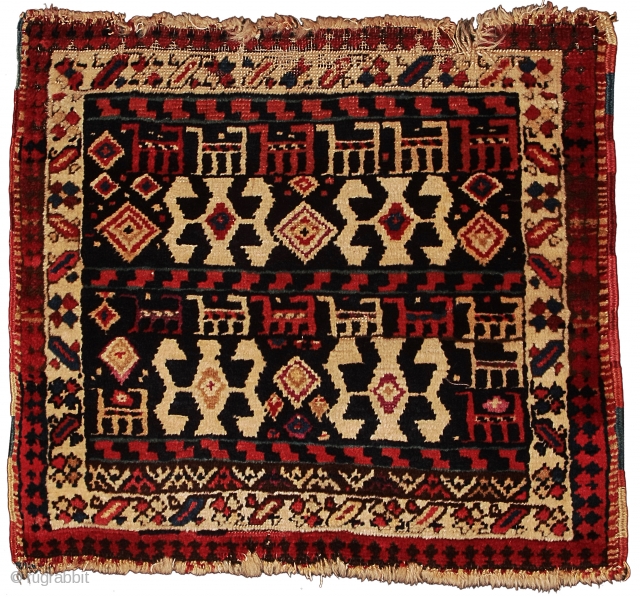 Pile khorjin face
Shahsavan Confederacy
Northwest Persia/Southern Caucasus
Circa 1870
46 x 52 cm (18 x 20.5 in.) 

Weaving Density:	10 V x 20 H = 200 kpsi.
Colours:	orange, peach, cochineal purple, light blue, dark blue, light yellow,  ...