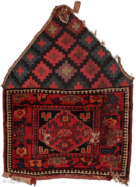 Pile khorjin recycled as saddle rug
Kurds of the Sauj Bulagh area
Northwest Persia
Circa 1850
63 x 43 cm (25 x 17 in.) 

Weaving Density:	10 H x 8 V = 80 kpsi.
Colours:	maroon, pinkish red, apricot,  ...