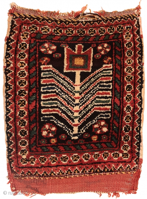 Pile bag face, Afshar tribe, Southern Persia, Circa 1900, 43 x 35 cm (17 x 14 in.) 
Knot count:	8 H x 9 V = 72 kpsi.
Colours:	brick red, dark blue, yellow, emerald green,  ...