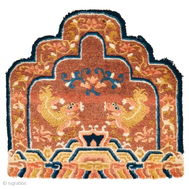 Throne back cover with Lion Dogs, Ningxia, Northern China, Qing Dynasty, Circa 1830, 67 x 65 cm (26.5 x 25.5 inches)
A true gem distinguished by a plethora of shades of red, blue  ...