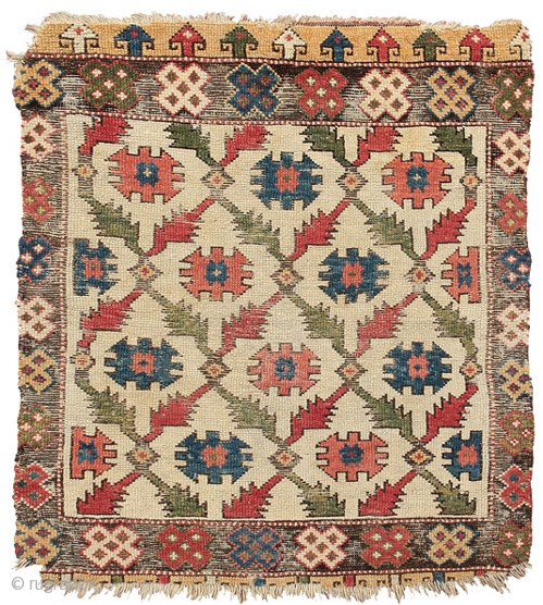 White ground rug with tribal emblems
Cappadocia 
East central Anatolia 
18th century 
111 x 90 cm (3’8” x 3’) 
L 126
symmetrically knotted wool pile on a wool foundation
The carefully drawn pattern of interlocking  ...