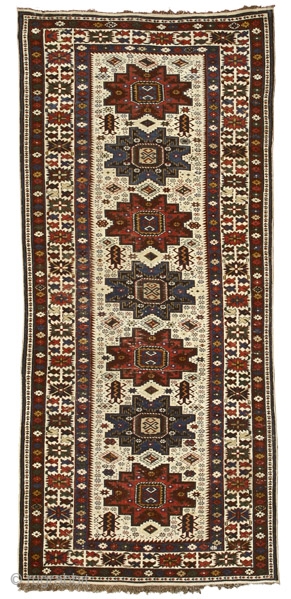 White ground Shirvan rug with Lesghi stars
Northeast Caucasus
circa 1850
257 x 105 cm (8’5” x 3’5”) 
Alg 1587
symmetrically knotted wool pile on wool warps and cotton wefts
It has been by now ascertained that  ...