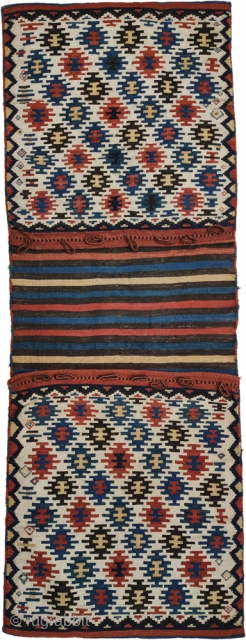 Kilim saddlebag, Qarabagh area, Central Transcaucasia, circa 1880, 64 x 160 cm (25 x 63 inches) Part of our current online exhibition
https://www.albertolevi.com/exhibitions/from-eurasia-with-love/

The infinite repeat pattern of hexagonal devices with a sawtooth outline  ...