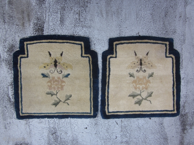 Two shaped Peking Chinese mats circa 1920's,each measuring 1.5 x 1.5.Charming mats with lush,unworn piles,with indented top corners.The creamy beige fields of each has a butterfly and paeony spray on an otherwise  ...