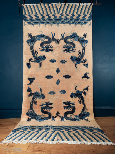 large Ningxia Dragon Carpet

A large Ningxia Dragon Carpet with two matched pairs of imperial five clawed dragons among Lingzhi shaped clouds on a soft peach coloured ground. Capped at  both ends  ...