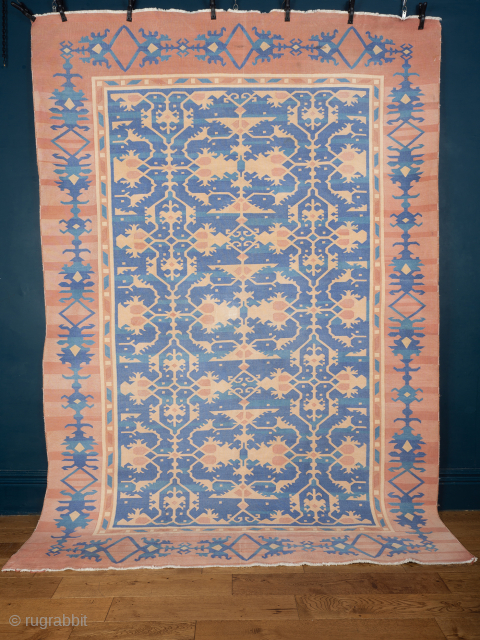 Fine Blue and Coral Dhurrie Rug


An exceptionally fine Indian cotton Dhurrie rug in blue and coral, with a highly unusual Lotto design* more commonly associated with early Turkish carpets. India, circa 1940. 275cm  ...