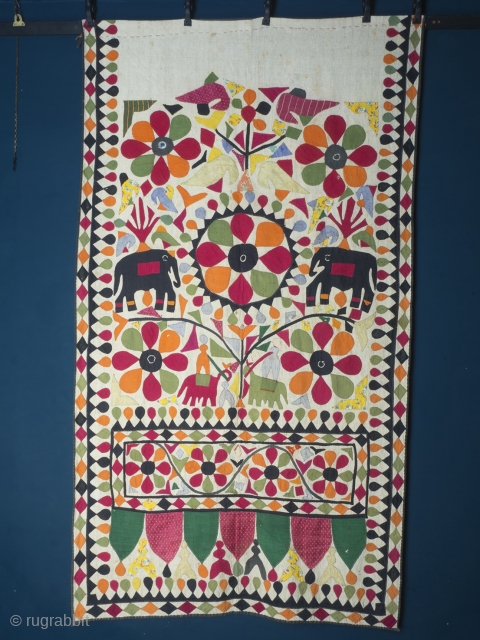 Cotton Quilt Cover With Applique, India, circa 1930. Handstitched applique, 104 x 183 cm (41 x 72 inches). Provenance: The Carol Summers Collection of Indian Folk Textiles.

Charming and delightful are two words  ...