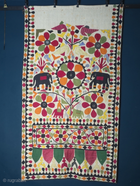 Cotton Quilt Cover With Applique, India, circa 1930. Handstitched applique, 104 x 183 cm (41 x 72 inches). Provenance: The Carol Summers Collection of Indian Folk Textiles.

Charming and delightful are two words  ...