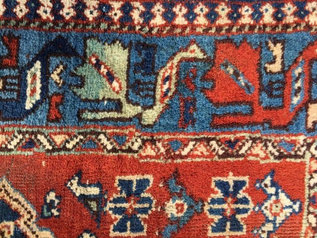 Peacock border on a Qashqai small rug, personal sitting rug? Gabbeh style drawing, scattered totemic motifs. Thick pile, soft wool, excellent colors. Nice Qashqai gol in the middle. Very good condition, two  ...