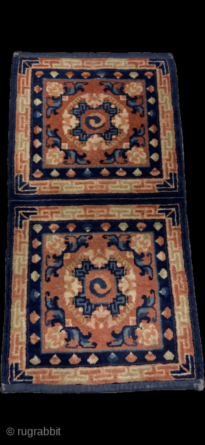Double Tibetan mat, late 19th century, all natural colors. Subtle differences between the two, the lower one has a more mellow tone and has a slightly larger medallion. Original cloth binding of ...