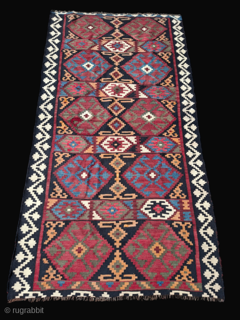 Very beautiful kilim, strong graphics and deep natural colors. Around 1920, probably Afshar from Veramin. Size 250 x 133 cm. Several small professional repairs and some signs of age. Very sturdy slitweave,  ...
