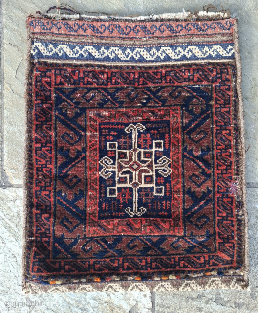 Baluch bag with exceptional dragon border and gul center. Nice kilim back. Softest wool. All natural colors except the 'dileks' at the bottom. These may be a later addition given the archaic  ...