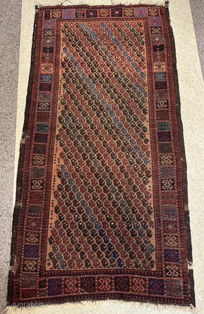 Antique Baluch Rug                              