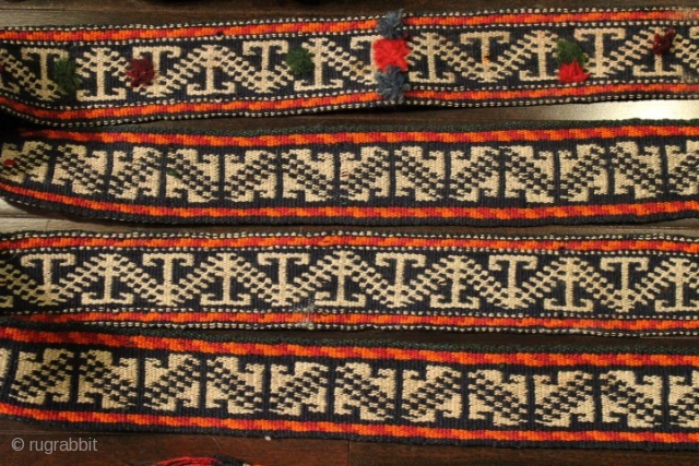 Very unique 70-80 years old Persian Qashqai- Darreh Shuri hand-woven malband
with original wooden buckle with vegetable dyes & 100% wool
CATEGORY: Persian
ORIGIN/TYPE: Qashqai / darreh Shuri malband 
AGE CLASSIFICATION: 1940+
SIZE:2.7" (7cm) x 220"  ...