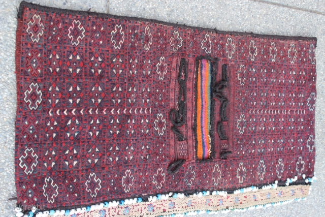 the spectacular and tribal artwork old Persian Afshari hand-woven sumak saddlebag with original plain weave back & 100% wool category: Persian origin/type: Afshari / Kuhi design Age Classification: 1940+ size: 26" (68cm)  ...