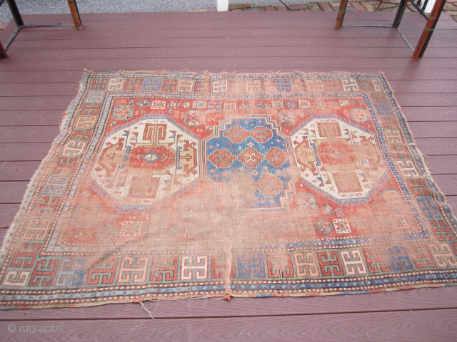 antique worn caucasian kazak rug measure 5' 2" x 6' condition is worn as shown solid rug not dry beautiful colors 675.00 or best offer        