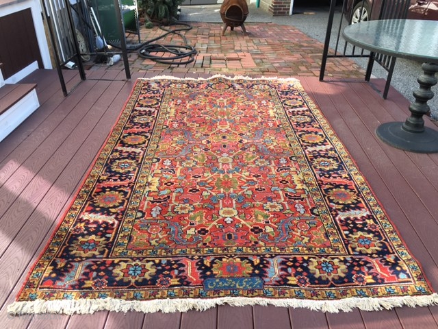 authentic signed persian heriz rug measures 5' 7" x 8' 9" great rare size beautiful colors great condition minor surface wear in the middle and few minor moth bite on the side  ...