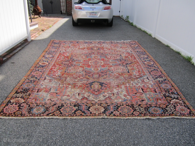 nicely worn persian heriz serapi rug measuring 8' 10" x 11' 4" great colors wear as shown one end needs work very supple no dry rot no animal well made very reasonable.  ...