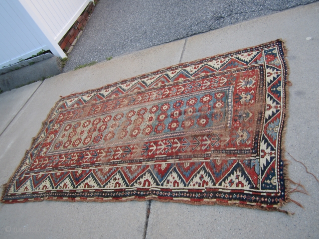 solid antique caucasian rug in worn condition great design and colors clean rug no dry rot. 4' 2"  x 7' 4" SOLD THANKS         