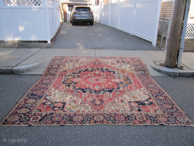 antique heriz serapi rug measuring 9' 5" x 11' 3" great design and colors has wear but solid rug very floppy  both ends and sides are good no holes clean rug  ...