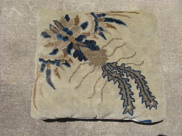 A vintage pillow made from a fragment of an antique hand knotted wool Chinese Peking rug, the rug was made around 1900, the image is a phoenix bird in blues, tans, gray,  ...
