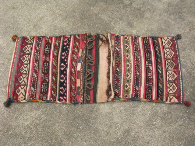 storage bags, mixture of pile and plain weave face, plain weave kilim back, stains, 1920s-30's, the origin is a mystery to me, but I always thought these were from NW Iran, symmetrical  ...