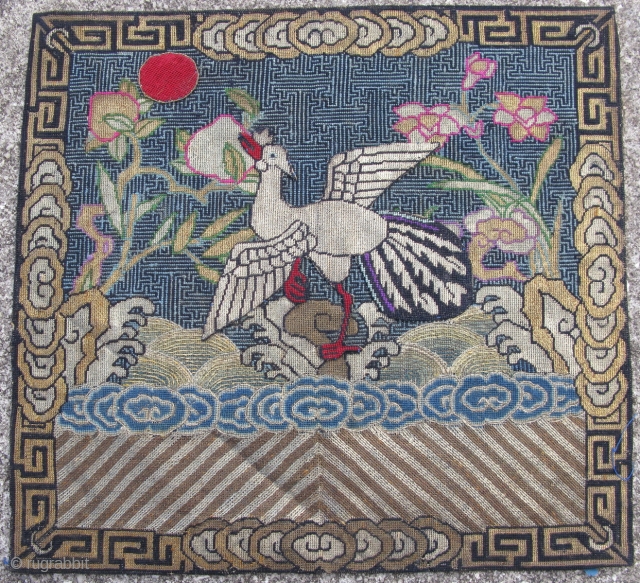 Antique Chinese textile, rank badge, mandarin square, with applique silver pheasant, 5th civil rank, and applique red sun, hand embroidered silk and gold and silver threads, fine petit point with an average  ...