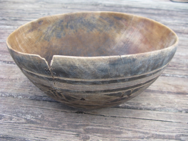 Old African wooden bowl, hand carved, Tuareg People, Sahara, ( Berber, Twareg ), used to collect milk, make dough, and other domestic chores, chiped, cracked and repaired, scuffs and scratches, this is  ...