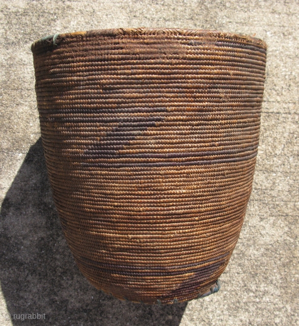 Old African basket, finely hand coiled plant fiber, some weavers dyed indigo, Tutsi People of Rwanda, prior to 1950, it has a beautiful patina that only comes with age, the Tutsi are  ...