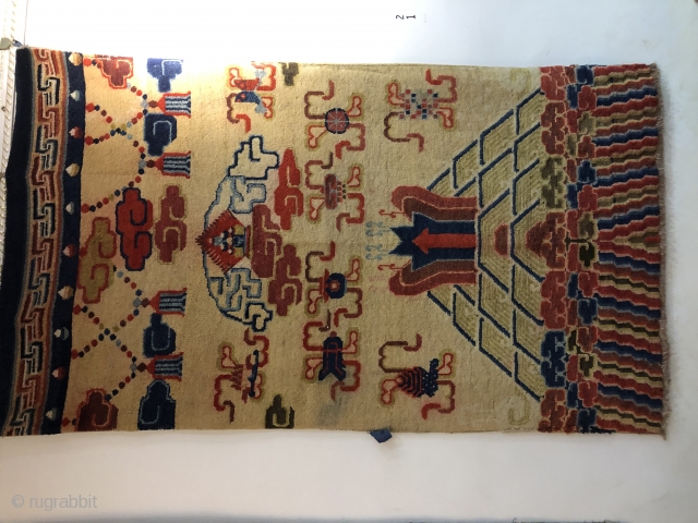 Chinese Baotou rug, size 183*107cm. The water beads spurred out from the sea water and cliffs , with lucky clouds and Buddhist 
treasures around are very beautiful. Good age excellent condition.  