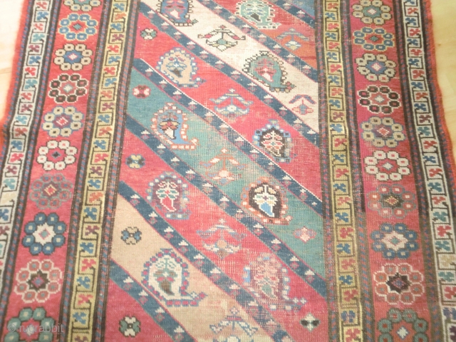 Kazak runner (small). Bit worn in the field in places, some repiling, edges secured but plenty of life left. Decent range of colours. 230 by 101cm.       