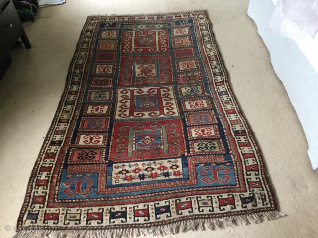 Late 19th early 20 th Caucasian with lots of Karachov features. Super thick lustrous wool. Some great colours and abrash. Love the striking design too. Small areas of repiling. Edges secured with  ...