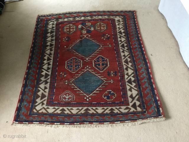 Sweet little Bordjalou. At this size and design it is usually more common to see prayer rugs. Some nice variation in the field. Repaired tear across the Middle. Bit of run on  ...