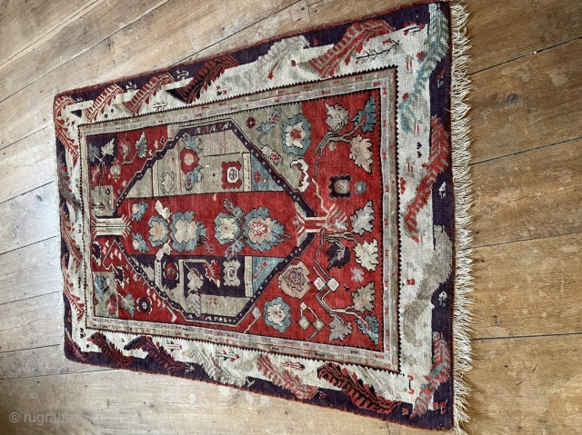 A fabulous Ada Melas from the 19th century. In good condition. Glorious colours. Subtle design. Exquisite touches 160 by 115cm.             