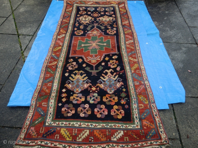 19th century kazak with strong armenian influences. Very unusual design. Subtle yet striking. Super borders. Broad array of colours. One tear in the end and one old repair also in the end,  ...