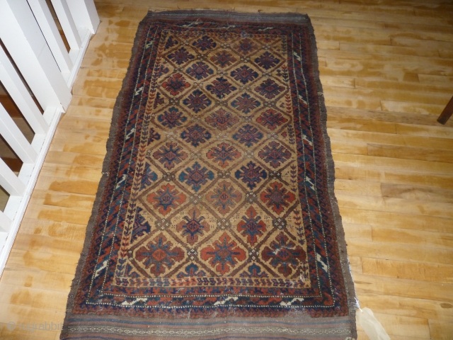 Balouch/NW Persian? Not my area or particular interest. Cute little rug with traditional colours and age. Well drawn. Goat selvedges? A few red and blue idiosyncracies in one half of the rug.  ...