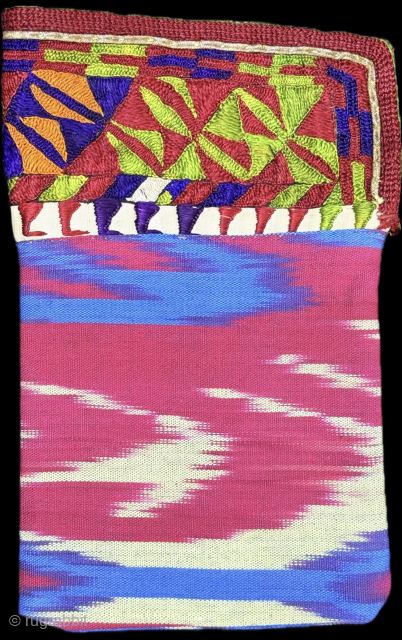 Turkmen silk embroidered and silk ikat double sided pouch. Size : 9.5'' x 6'' x ''24 cm x 15 cm'' turkmansilver@gmail.com.
