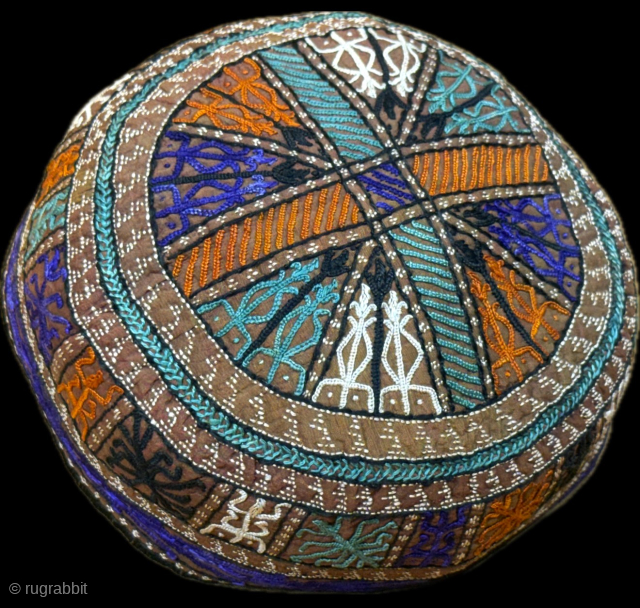 Turkmen silk chain stitched embroidered skullcap. Great saturated colors with zoomorphic designs. Amazing fine embroidery with saturated colors. Size - 3'' x 20'' - Height : ''7 cm x Circumference : 51  ...