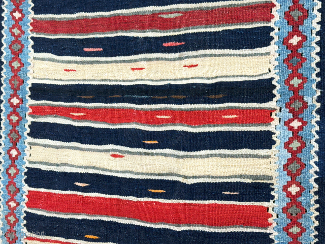 East Turkey Kurdish mini cradle kilim. They cover sleeping baby cradles with such mini kilim. İt is all wool on cotton with minimalist design. It has been carefully used for some time ...