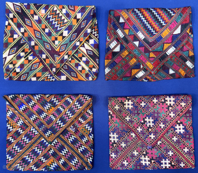 North Afghanistan silk embroidered envelope shape vanity bags. Mostly natural colors. Great shape and condition for daily use. turkmansilver@gmail.com.